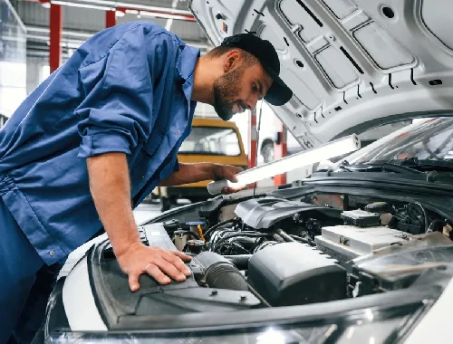Vehicle undergoing a roadworthy and safety inspection in the workshop