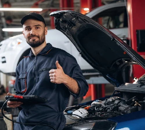 Friendly mechanic explaining vehicle issues in plain language