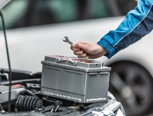 Technician testing battery and charging system on a customer vehicle