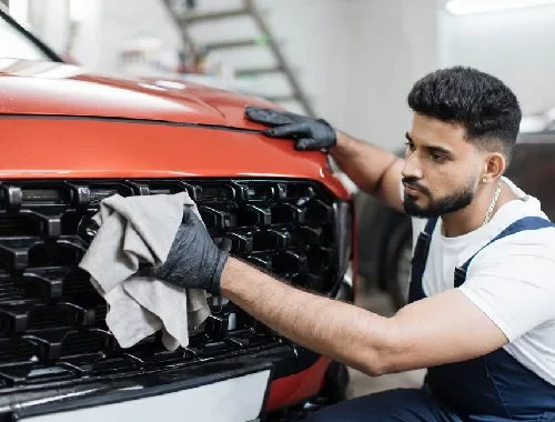 Vehicle being inspected and prepared for sale at a Sunshine North workshop